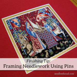 framing needlework using pins