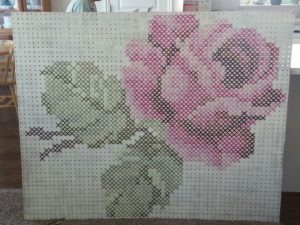rose cross stitch on pegboard