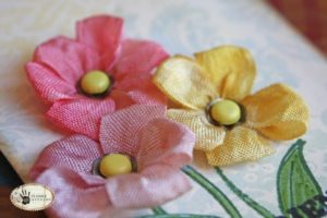 ribbon flowers with brad centers