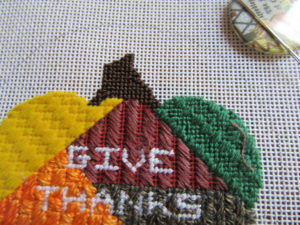red patch in needlepoint pumpkin