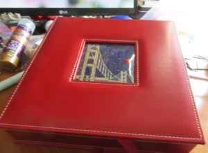 Lee photo albums with San Francisco needlepoint insert