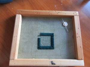 needlepoint with stretcher bars on top