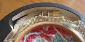 finished needlepoint on hoop in hoop frame (detail)