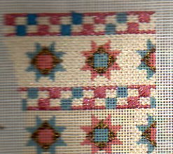 partially stitched vintage needlepoint ornament
