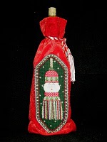 needlepoint ornament finished on bottle bag