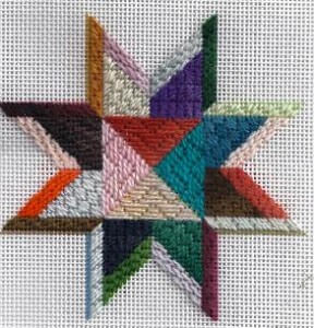 needlepoint star ornament from Patt & Lee, stitched by needlepoint expert janet m perry using gumnuts wool thread