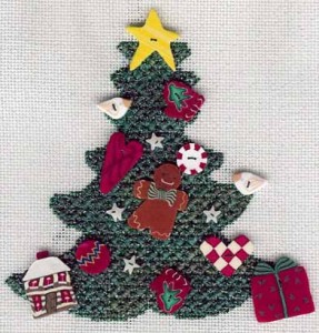 needlepoint christmas ornament created using cookie cutter designed by needlepoint expert janet m. perry
