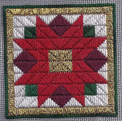 poinsettia needlepoint ornament designed by needlepoint expert janet m. perry