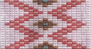 Cashmere stitch needlepoint based on Native American rug pattern, designed and stitched by needlepoint expert janet m. perry