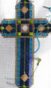 planet earth variegated 6-ply silk thread shown on Lee Needle Arts cross, stitched by needlepoint expert janet m. perry