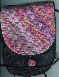 needlepoint purse flap made with overdyed floss and the arte johnson stitch in scrap bag needlepoint, stitch by needlepoint expert janet m. perry