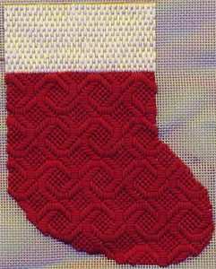 needlepoint mini-sock showing directional light in threads