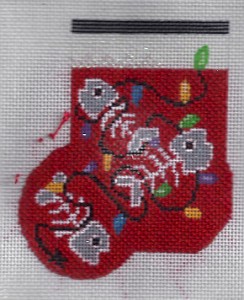 Open background stitch on needlepoint mini-sock