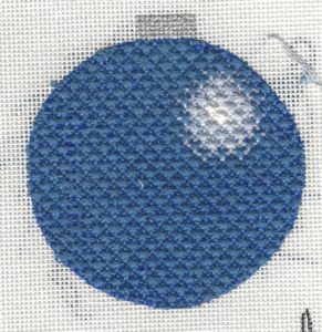 needlepoint ornament shaded with layered stitches
