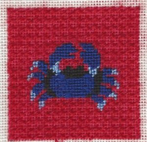 Patty Paints needlepoint crab stitched with non-metallic shiny threads