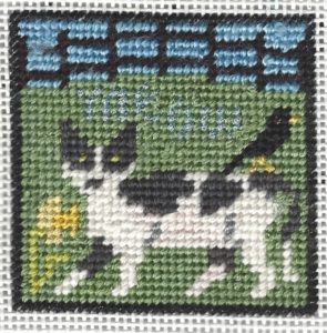 prairie schooler cat needlepoint