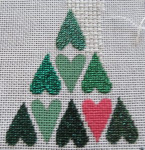 needlepoint tree of hearts showingmetallic finishes