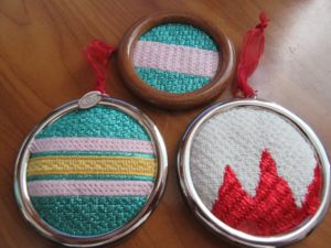 shiny bright needlepoint rounds finished as ornaments