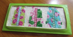 Two Sisters shist canvas needlepoint in Planet Earth long credit card case