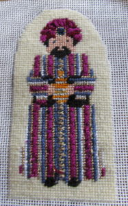 Petei needlepoint wiseman in striped robe