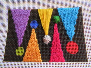 Zecca needlepoint with triangles & circles