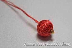 thread-wrapped bead berry