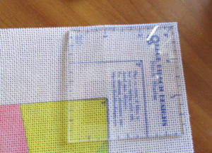 corner gauge on needlepoint canvas