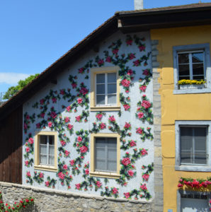 house with flora; cross stitch facing
